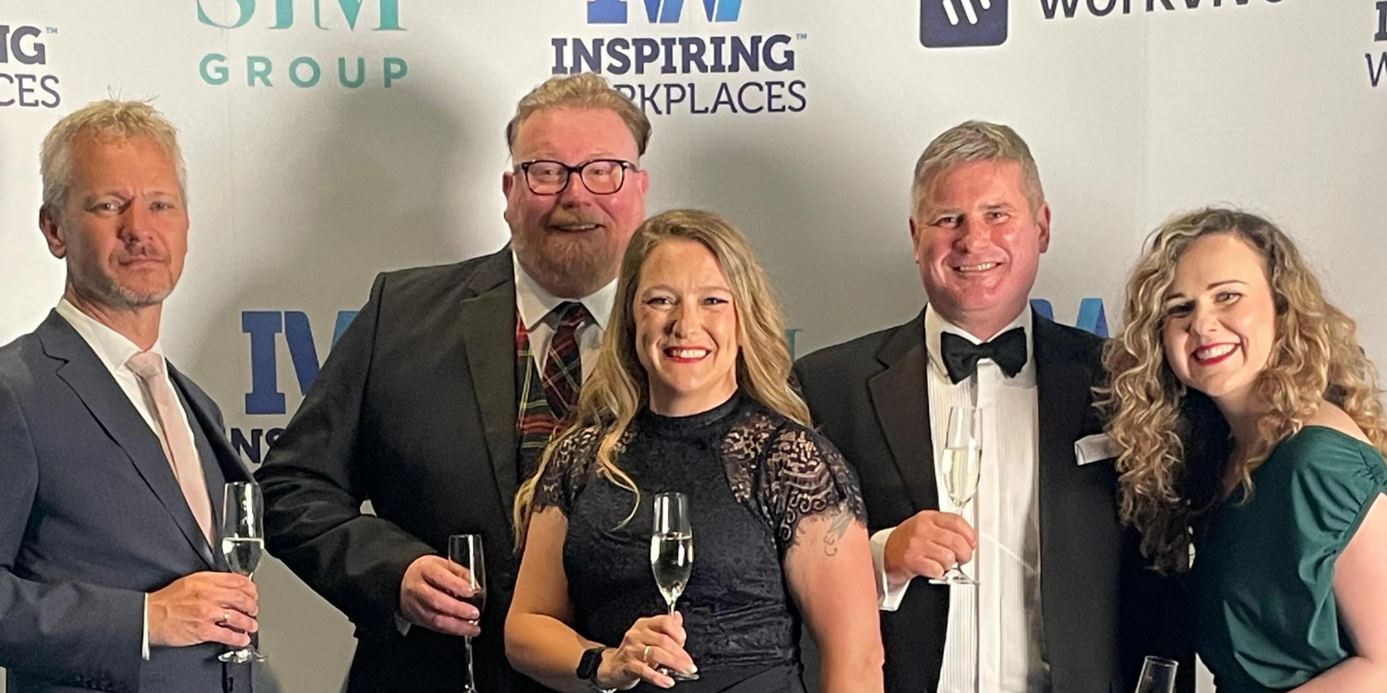 TimeXtender team at Inspiring Workplaces gala celebrating recognition demonstrating ideas within post about 3 Top Tips for Future of Work Success